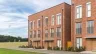 Red brick square building.