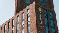 Knight House logo on side of building.