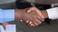 business people shake hands