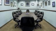 Board room with leather chairs.