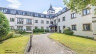 Courtyard of a building in the sun.