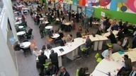 business conference with people on different desks