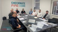 checkmate fire staff in meeting