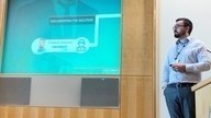 man gives presentation on implementing fire solutions
